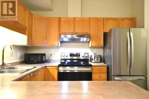 134 - 134 Hibernia Street, Cobourg, ON - Indoor Photo Showing Kitchen With Stainless Steel Kitchen With Double Sink