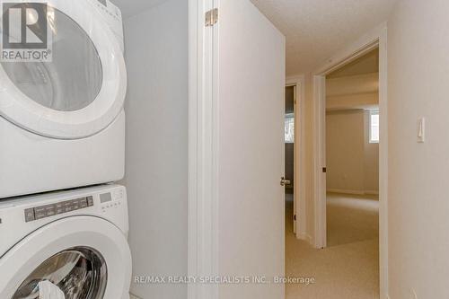 96 - 20 William Jackson Way, Toronto (New Toronto), ON - Indoor Photo Showing Laundry Room