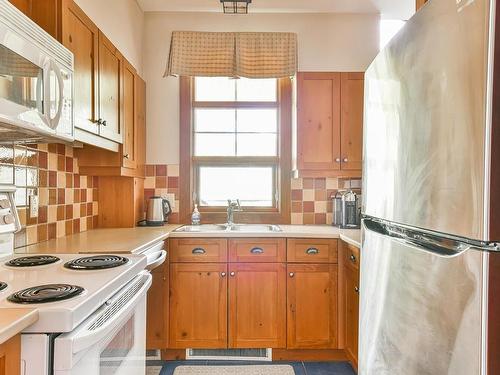 Cuisine - 5-229 Ch. Des Quatre-Sommets, Mont-Tremblant, QC - Indoor Photo Showing Kitchen With Double Sink