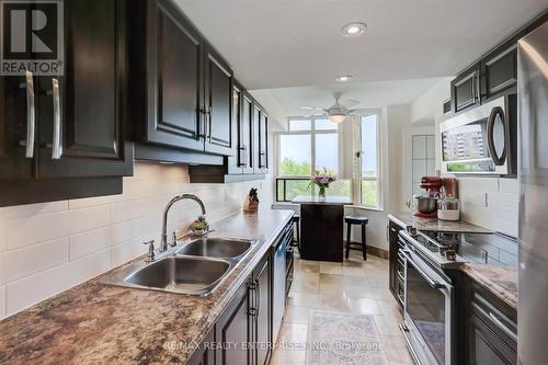 605 - 10 Malta Avenue, Brampton (Fletcher'S Creek South), ON - Indoor Photo Showing Kitchen With Double Sink With Upgraded Kitchen