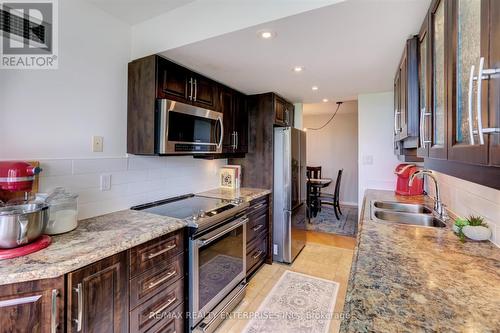 605 - 10 Malta Avenue, Brampton (Fletcher'S Creek South), ON - Indoor Photo Showing Kitchen With Double Sink With Upgraded Kitchen