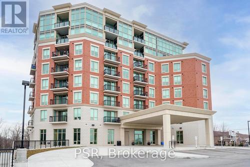 215 - 2750 King Street E, Hamilton (Stoney Creek), ON - Outdoor With Balcony With Facade