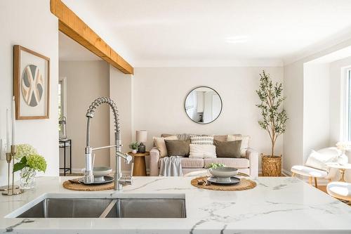 136 East 35Th Street, Hamilton, ON - Indoor Photo Showing Kitchen With Double Sink