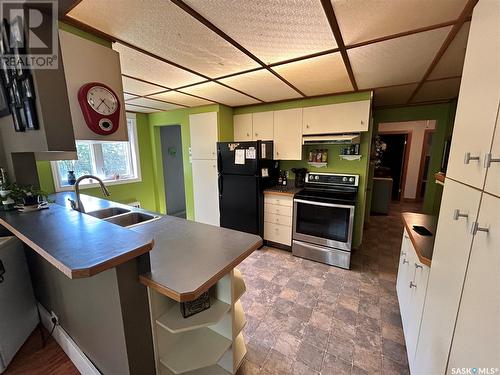 E 111 Wells Avenue E, Langenburg, SK - Indoor Photo Showing Kitchen With Double Sink