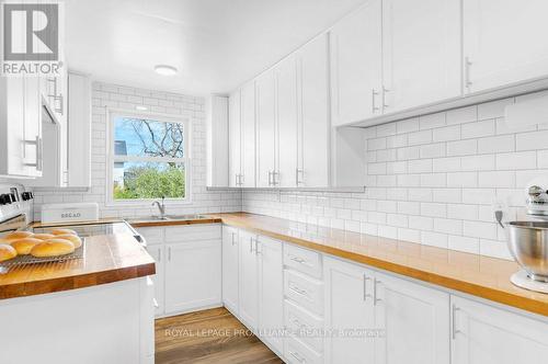 7 Porter Street, Prince Edward County (Hillier), ON - Indoor Photo Showing Kitchen With Double Sink