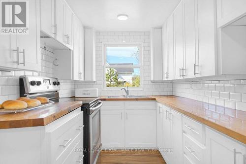 7 Porter Street, Prince Edward County (Hillier), ON - Indoor Photo Showing Kitchen With Double Sink