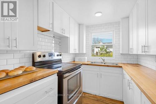 7 Porter Street, Prince Edward County (Hillier), ON - Indoor Photo Showing Kitchen With Double Sink