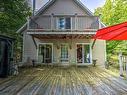 Back facade - 912 Ch. Du Lac-Winnetou, Amherst, QC  - Outdoor With Deck Patio Veranda 