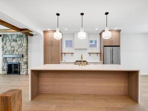 147-200 Grand Boulevard, Kamloops, BC - Indoor Photo Showing Kitchen With Fireplace