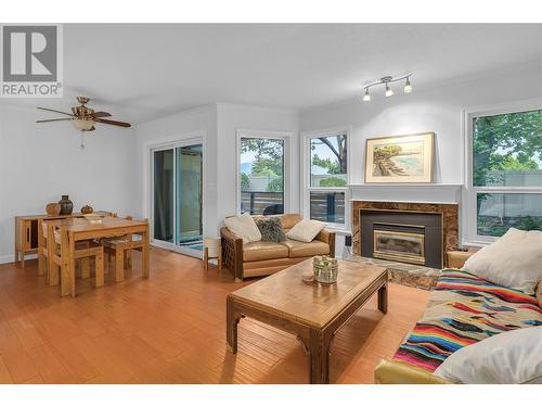 2125 Burtch Road Unit# 103, Kelowna, BC - Indoor Photo Showing Living Room With Fireplace