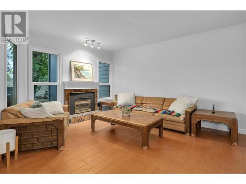 2125 Burtch Road Unit# 103, Kelowna, BC - Indoor Photo Showing Living Room With Fireplace