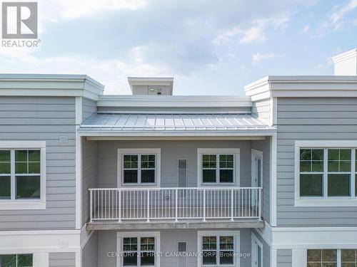 415 - 100 The Promenade, Central Elgin (Port Stanley), ON - Outdoor With Balcony With Facade