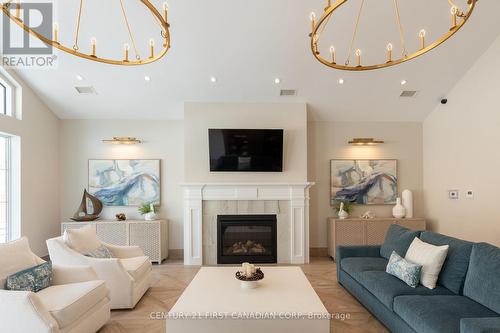 415 - 100 The Promenade, Central Elgin (Port Stanley), ON - Indoor Photo Showing Living Room With Fireplace