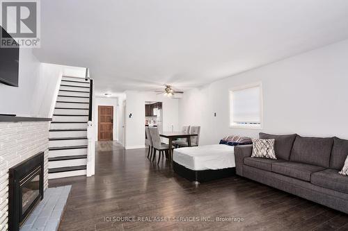 11 - 1010 Kipps Lane, London, ON - Indoor Photo Showing Living Room With Fireplace