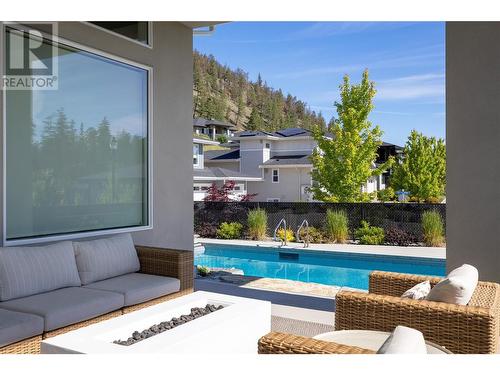 99 Forest Edge Place, Kelowna, BC - Outdoor With In Ground Pool With Deck Patio Veranda