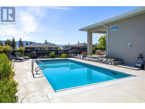 99 Forest Edge Place, Kelowna, BC - Outdoor With In Ground Pool