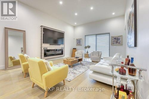 566 Lily Mac Boulevard, Windsor, ON - Indoor Photo Showing Living Room With Fireplace