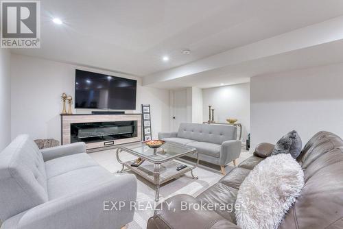 566 Lily Mac Boulevard, Windsor, ON - Indoor Photo Showing Living Room With Fireplace