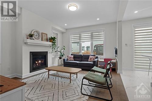 129 Shallow Pond Place, Ottawa, ON - Indoor Photo Showing Living Room With Fireplace