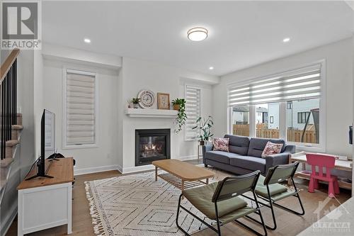 129 Shallow Pond Place, Ottawa, ON - Indoor Photo Showing Living Room With Fireplace