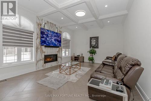 22 Pellegrini Dr Drive E, Vaughan (Kleinburg), ON - Indoor Photo Showing Living Room With Fireplace