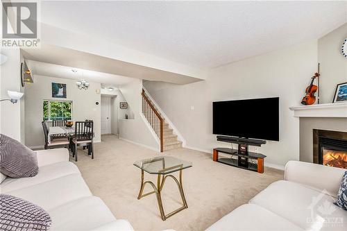 1672 Locksley Lane, Ottawa, ON - Indoor Photo Showing Living Room With Fireplace