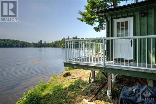 404 Horne Lake Road, Lanark Highlands, ON - Outdoor With Body Of Water With Deck Patio Veranda