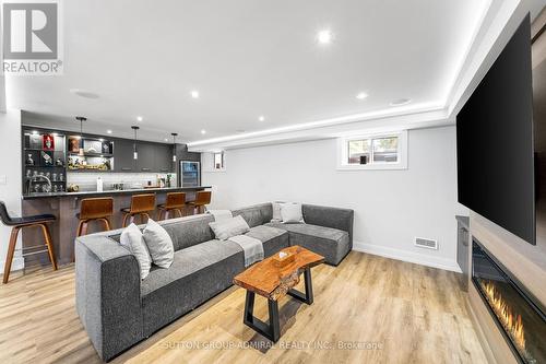 16 Benway Drive, Toronto (Rexdale-Kipling), ON - Indoor Photo Showing Living Room With Fireplace