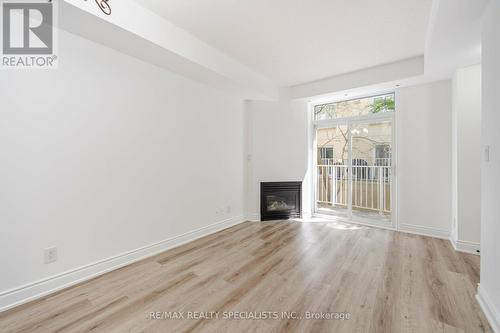 662 - 38 Stadium Road, Toronto (Niagara), ON - Indoor Photo Showing Living Room With Fireplace