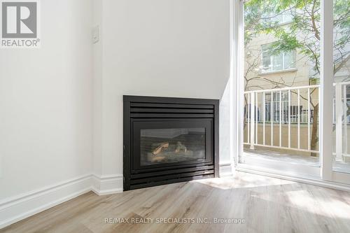 662 - 38 Stadium Road, Toronto (Niagara), ON - Indoor Photo Showing Living Room With Fireplace