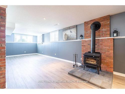 59 Backus Dr, Norfolk, ON - Indoor Photo Showing Other Room With Fireplace