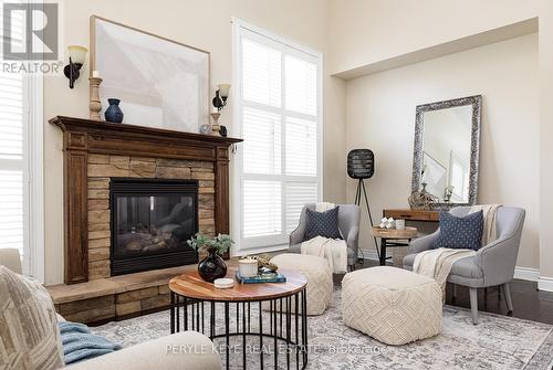 67 Clearbrook Trail, Bracebridge, ON - Indoor Photo Showing Living Room With Fireplace