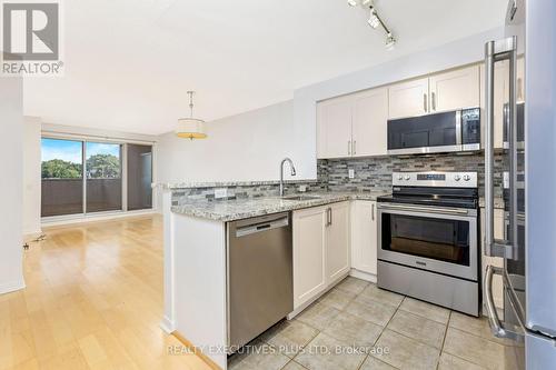 212 - 1050 The Queensway, Toronto (Islington-City Centre West), ON - Indoor Photo Showing Kitchen With Stainless Steel Kitchen With Upgraded Kitchen