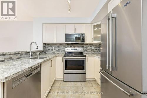 212 - 1050 The Queensway, Toronto (Islington-City Centre West), ON - Indoor Photo Showing Kitchen With Stainless Steel Kitchen With Upgraded Kitchen