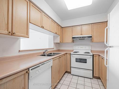 605-2 Covington Rd, Toronto, ON - Indoor Photo Showing Kitchen With Double Sink