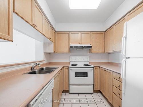 605-2 Covington Rd, Toronto, ON - Indoor Photo Showing Kitchen With Double Sink