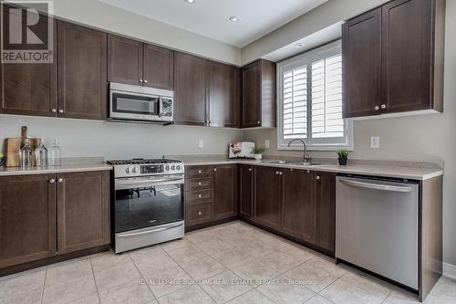 60 - 4823 Thomas Alton Boulevard, Burlington (Alton), ON - Indoor Photo Showing Kitchen With Double Sink