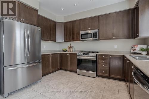 60 - 4823 Thomas Alton Boulevard, Burlington (Alton), ON - Indoor Photo Showing Kitchen With Stainless Steel Kitchen With Double Sink