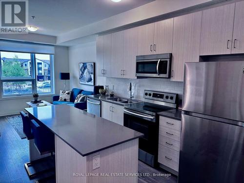 204 - 1105 Leger Way, Milton, ON - Indoor Photo Showing Kitchen With Double Sink