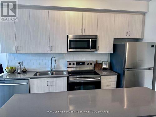 204 - 1105 Leger Way, Milton (Ford), ON - Indoor Photo Showing Kitchen With Double Sink With Upgraded Kitchen