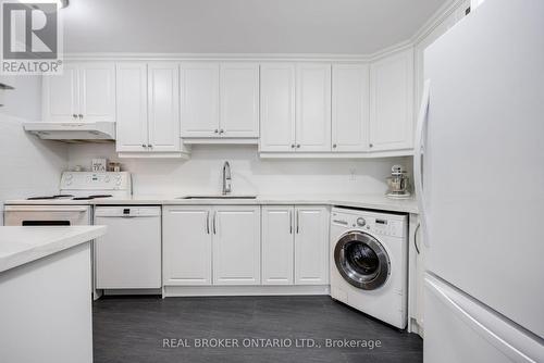 412 - 714 The West Mall, Toronto (Eringate-Centennial-West Deane), ON - Indoor Photo Showing Laundry Room