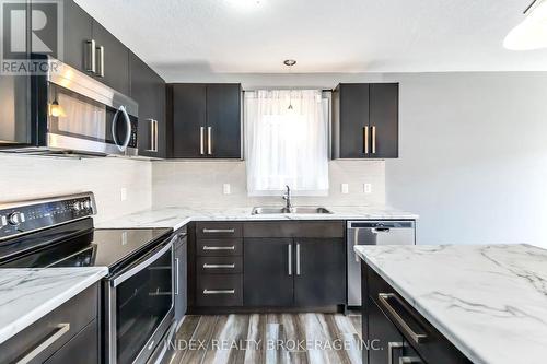 750 Freeport Street, London, ON - Indoor Photo Showing Kitchen With Double Sink With Upgraded Kitchen