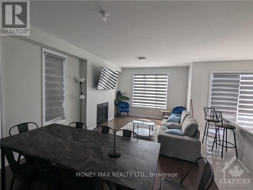 242 Beaugency Street, Ottawa, ON - Indoor Photo Showing Living Room With Fireplace