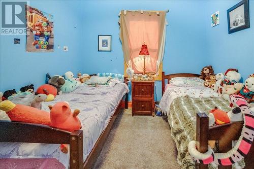 2489 Purdy Road, Robson, BC - Indoor Photo Showing Bedroom