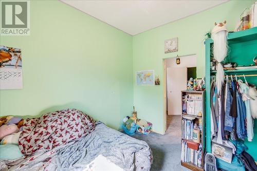 2489 Purdy Road, Robson, BC - Indoor Photo Showing Bedroom