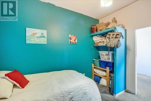 2489 Purdy Road, Robson, BC - Indoor Photo Showing Bedroom