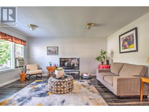 340 28 Street Ne, Salmon Arm, BC - Indoor Photo Showing Living Room With Fireplace