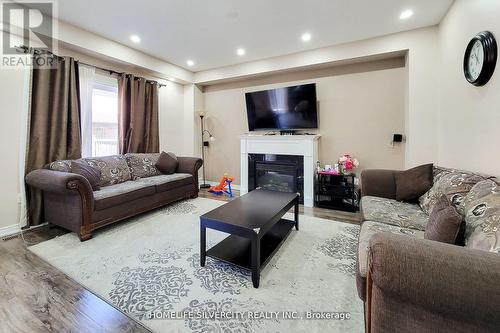 189 Palacebeach Trail, Hamilton (Stoney Creek), ON - Indoor Photo Showing Living Room With Fireplace