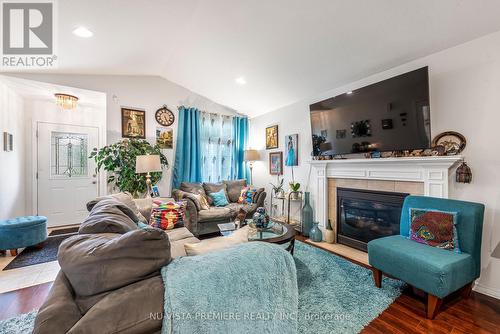 963 Bitterbush Crescent, London, ON - Indoor Photo Showing Living Room With Fireplace