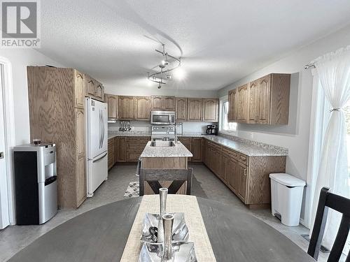 9024 114 Avenue, Fort St. John, BC - Indoor Photo Showing Kitchen With Double Sink